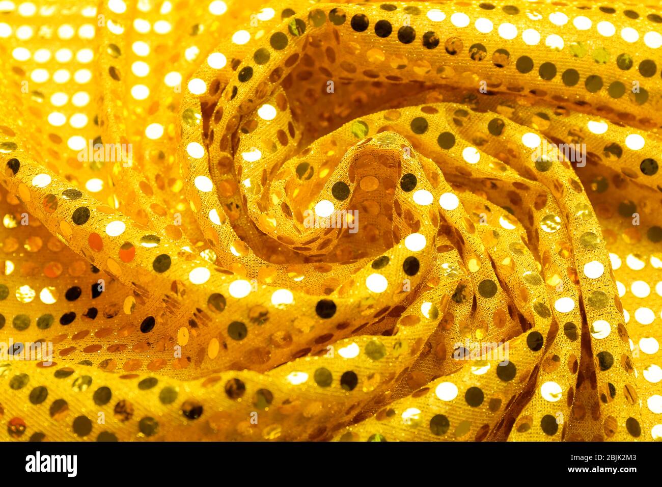 Bright yellow sequin fabric texture Stock Photo