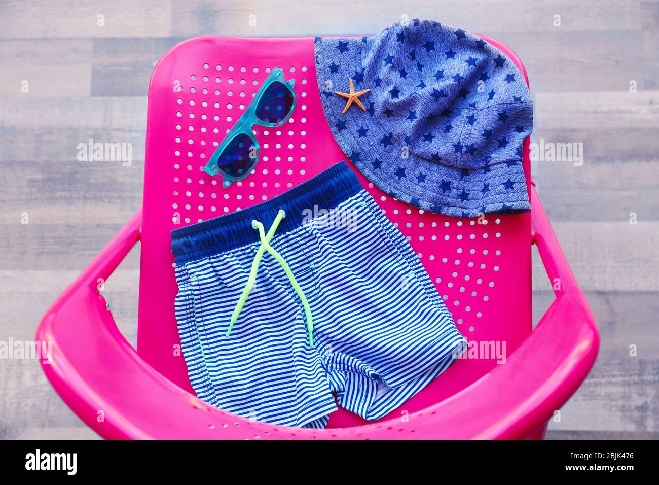 Set of baby beach accessories on chair indoors Stock Photo Alamy