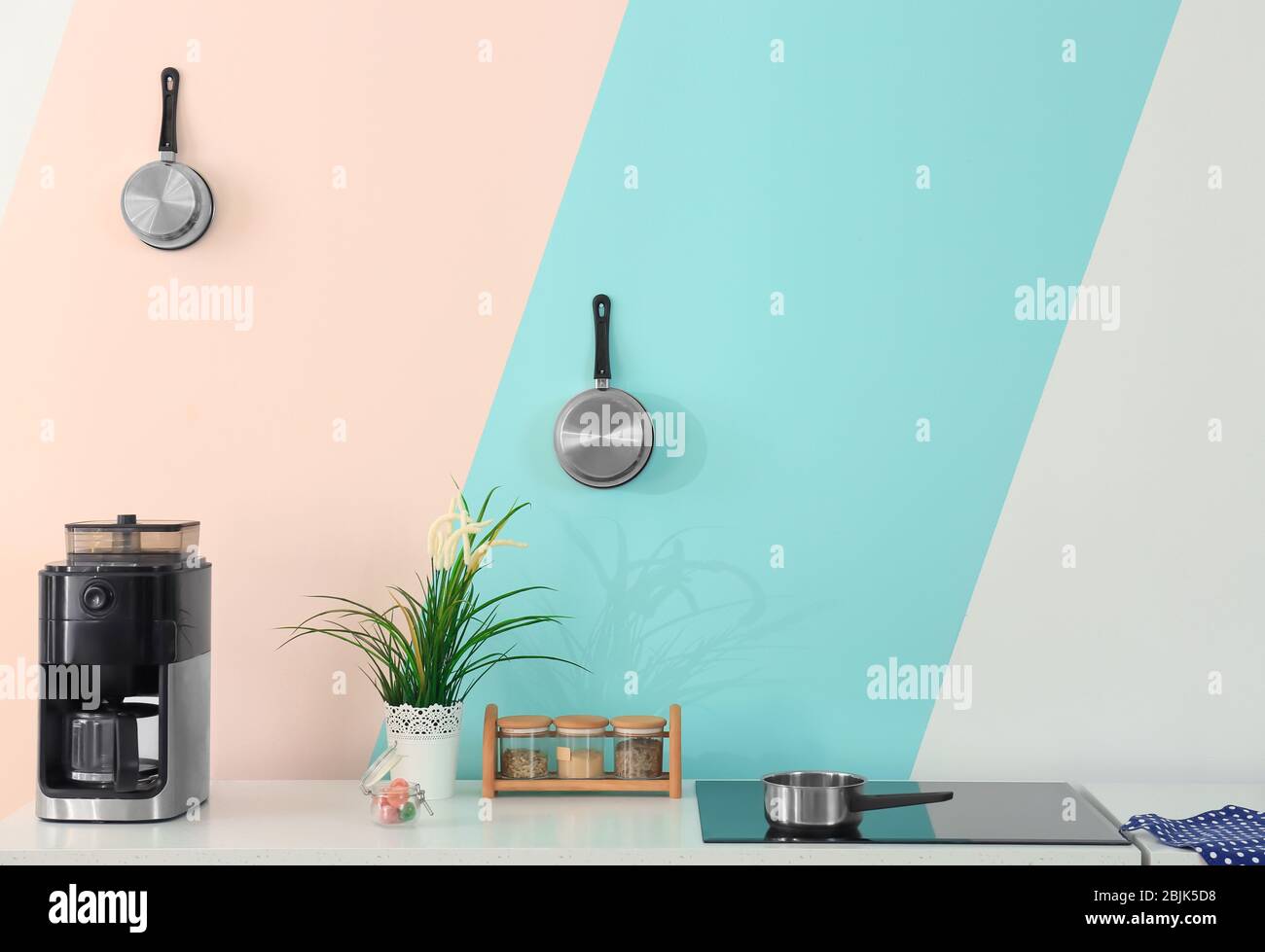 Modern kitchen with stylish furniture and electric stove Stock Photo ...