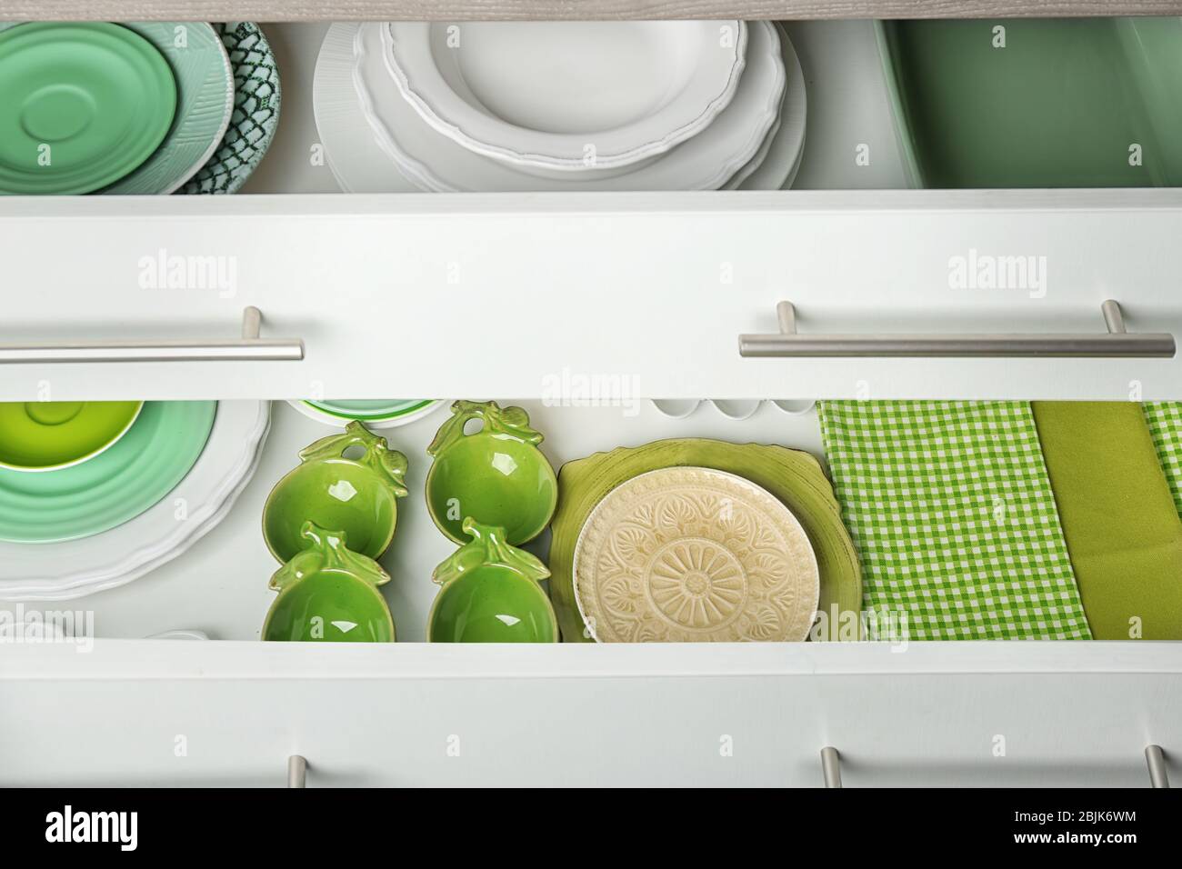 Drawers with different kitchenware Stock Photo - Alamy