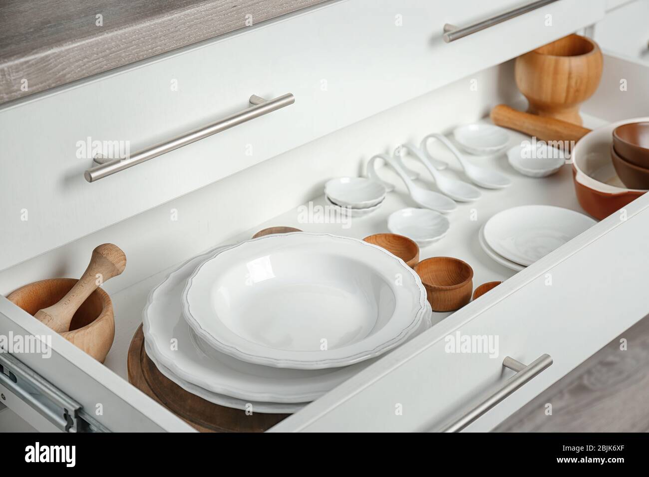 Drawer with different kitchenware Stock Photo - Alamy