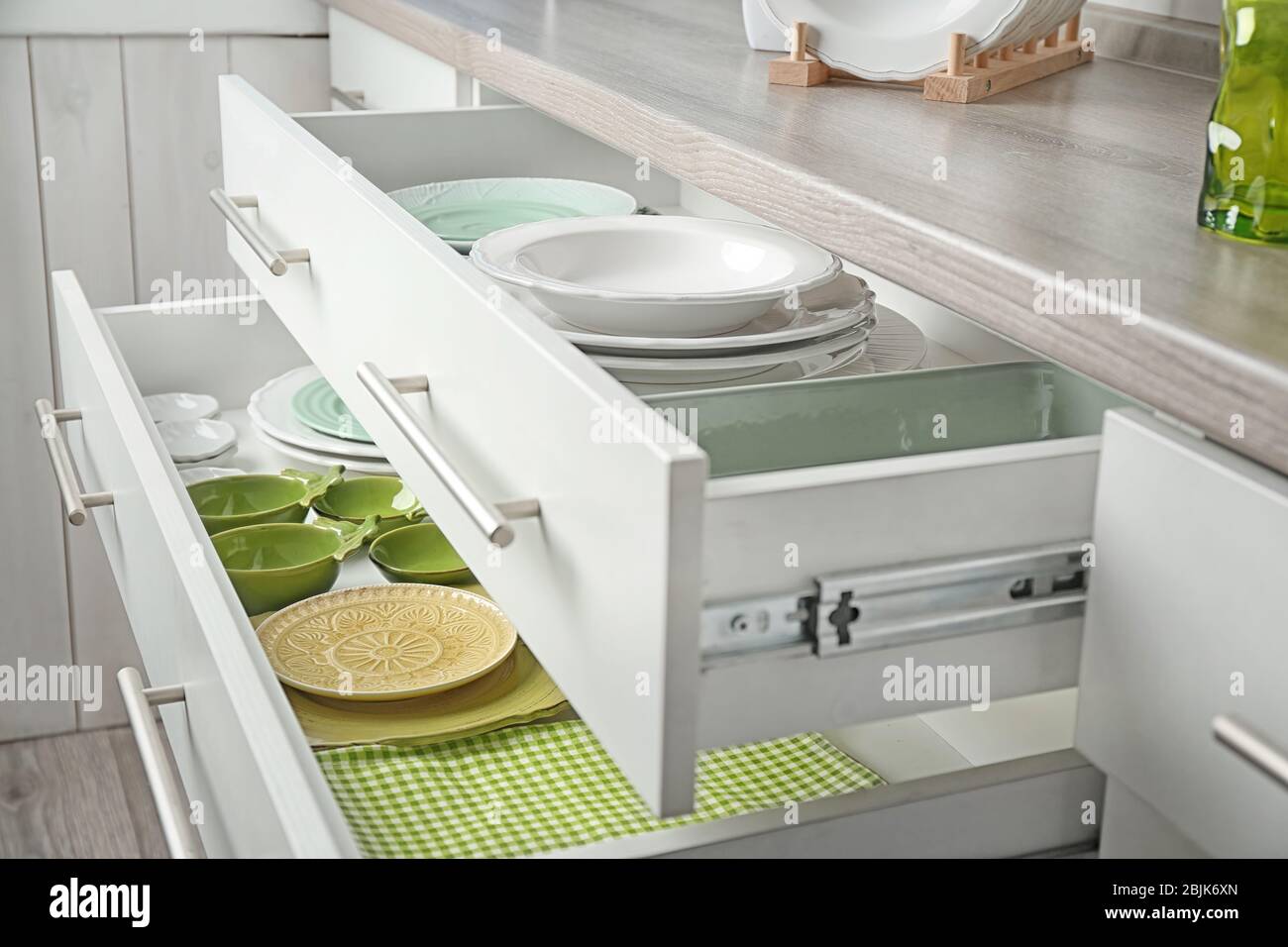 Drawers with different kitchenware Stock Photo - Alamy