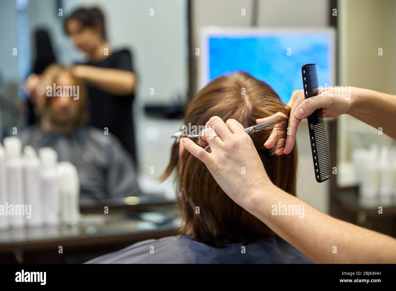 Hairdresser Cutting Hair High Resolution Stock Photography And Images Alamy