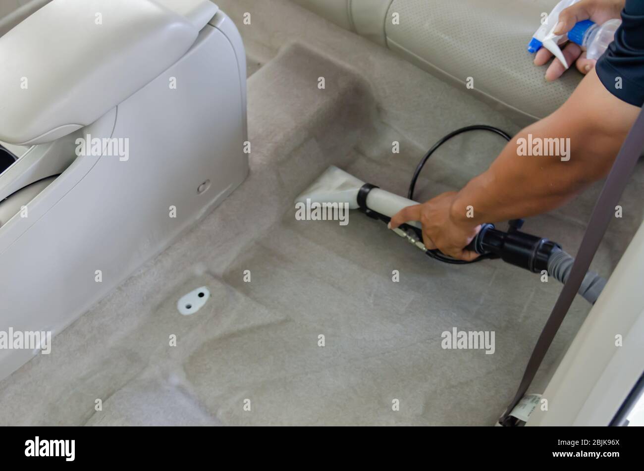 Clean the car carpet with a cleaning machine.Kill germs with chemicals