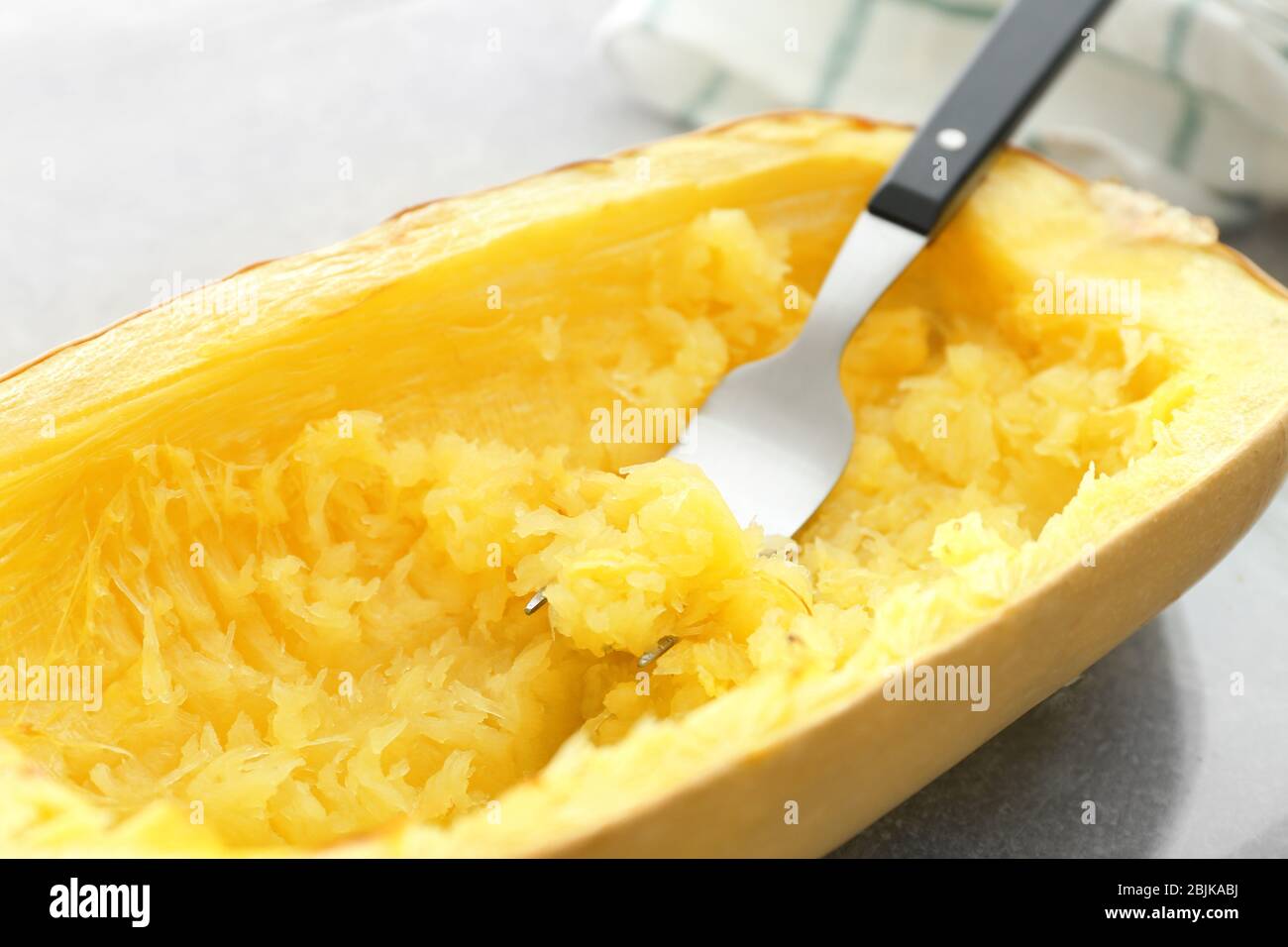 Cooked spaghetti squash with fork hires stock photography and images