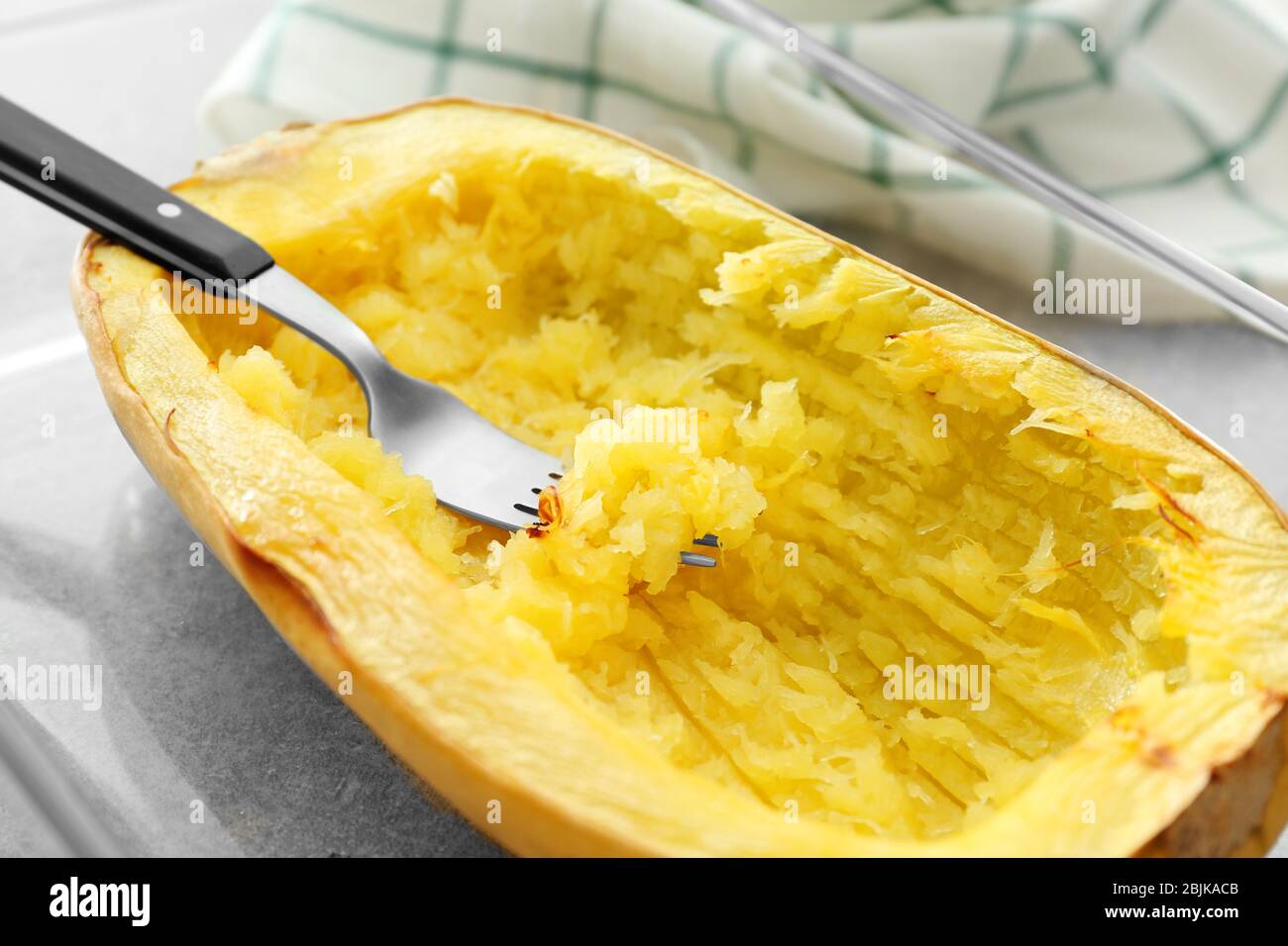 Cooked spaghetti squash with fork hires stock photography and images
