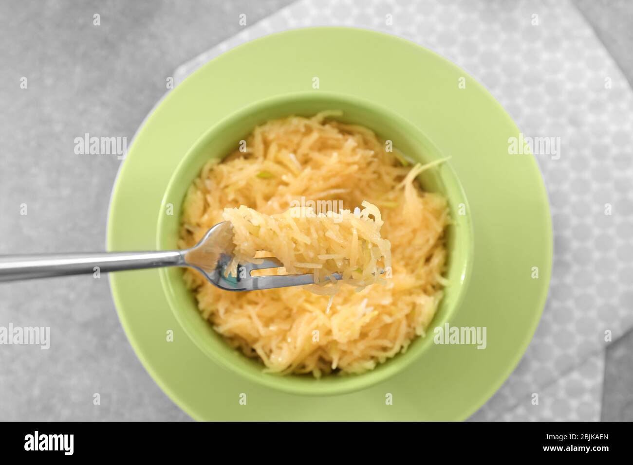 Cooked spaghetti squash with fork hires stock photography and images