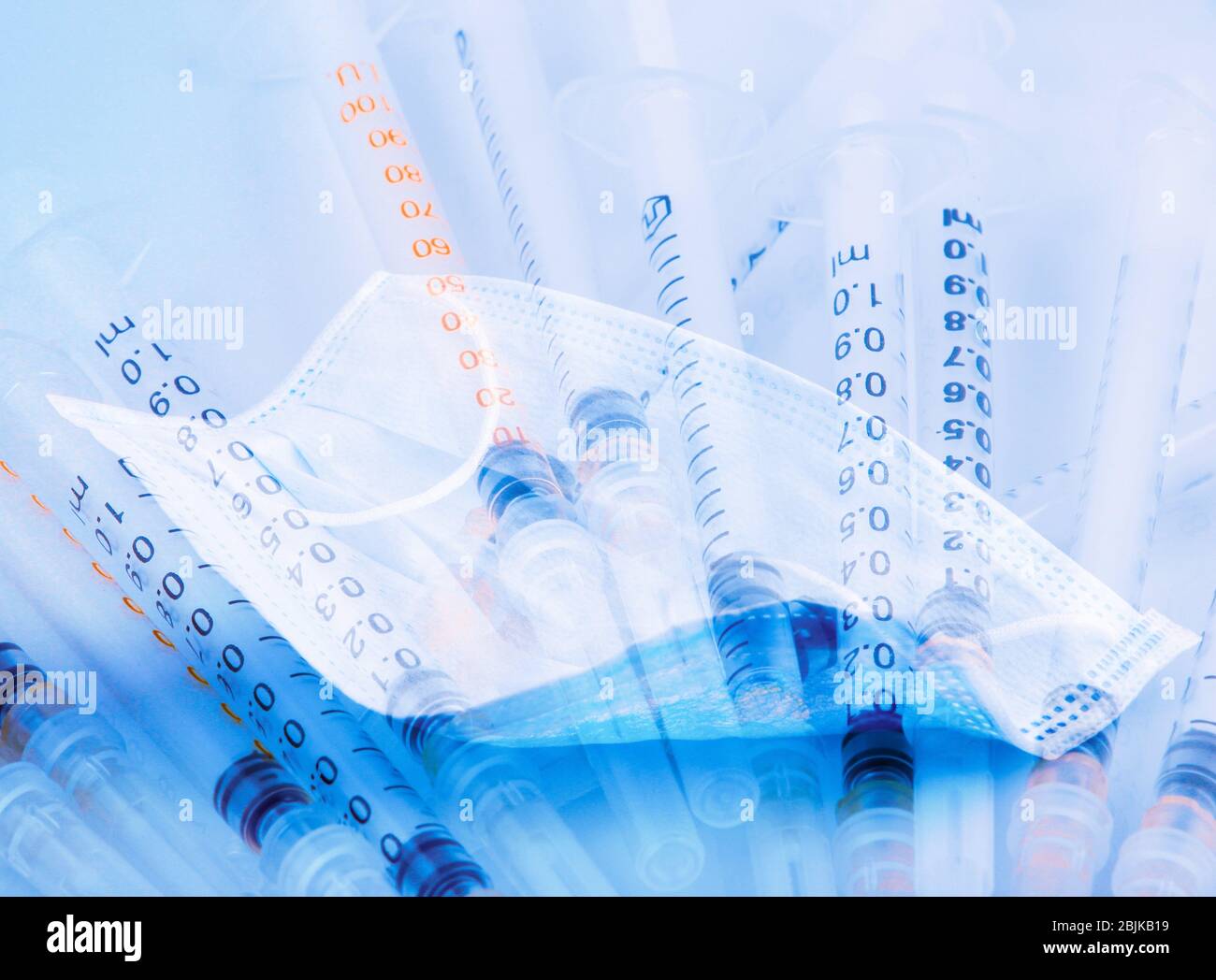 Double Exposure Image Of Seasonal Flu Vaccine And Medical Face Mask Stock Photo Alamy