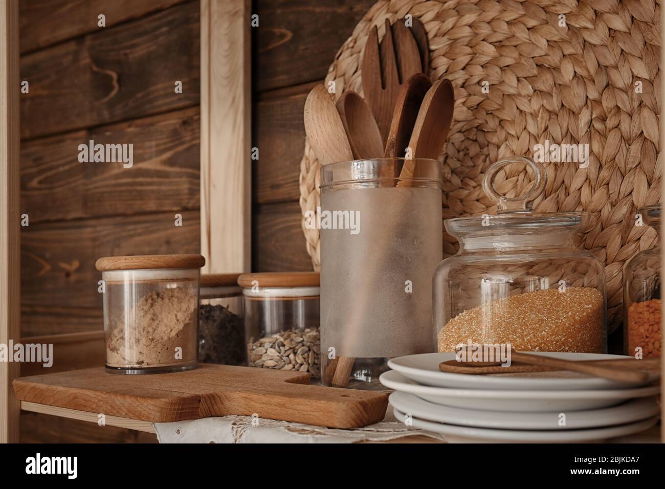Kitchen stuff on wooden shelf Stock Photo - Alamy