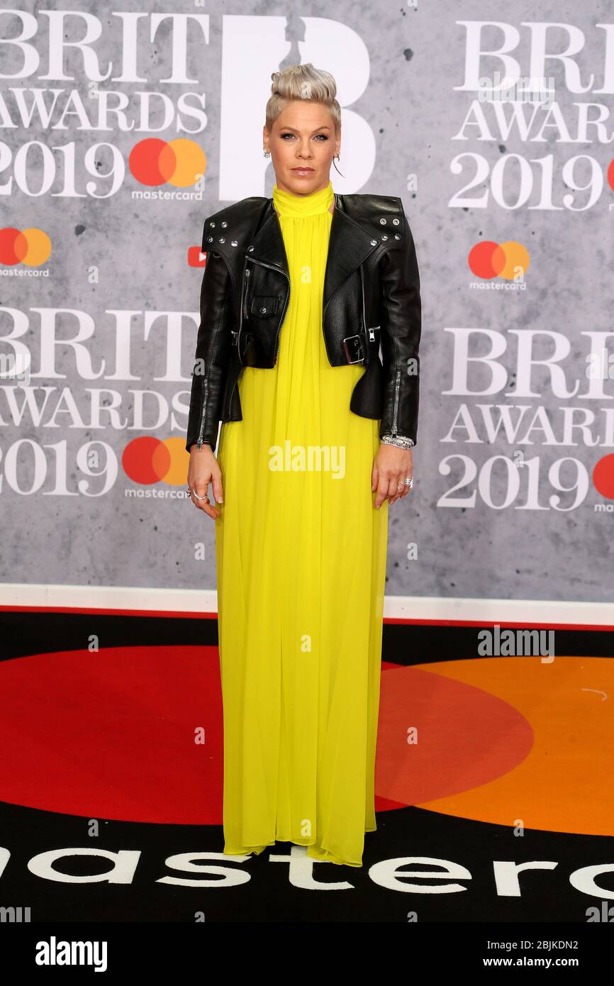 Full length black dress neon yellow heels hi res stock photography and images Alamy
