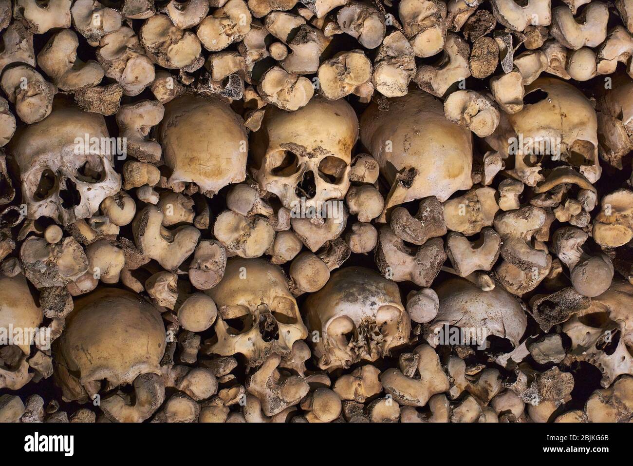 remains of human bones embedded in the wall. Stock Photo