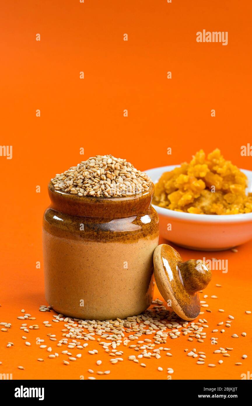 Sesame Seeds in clay pot with Jaggery in bowl Stock Photo Alamy