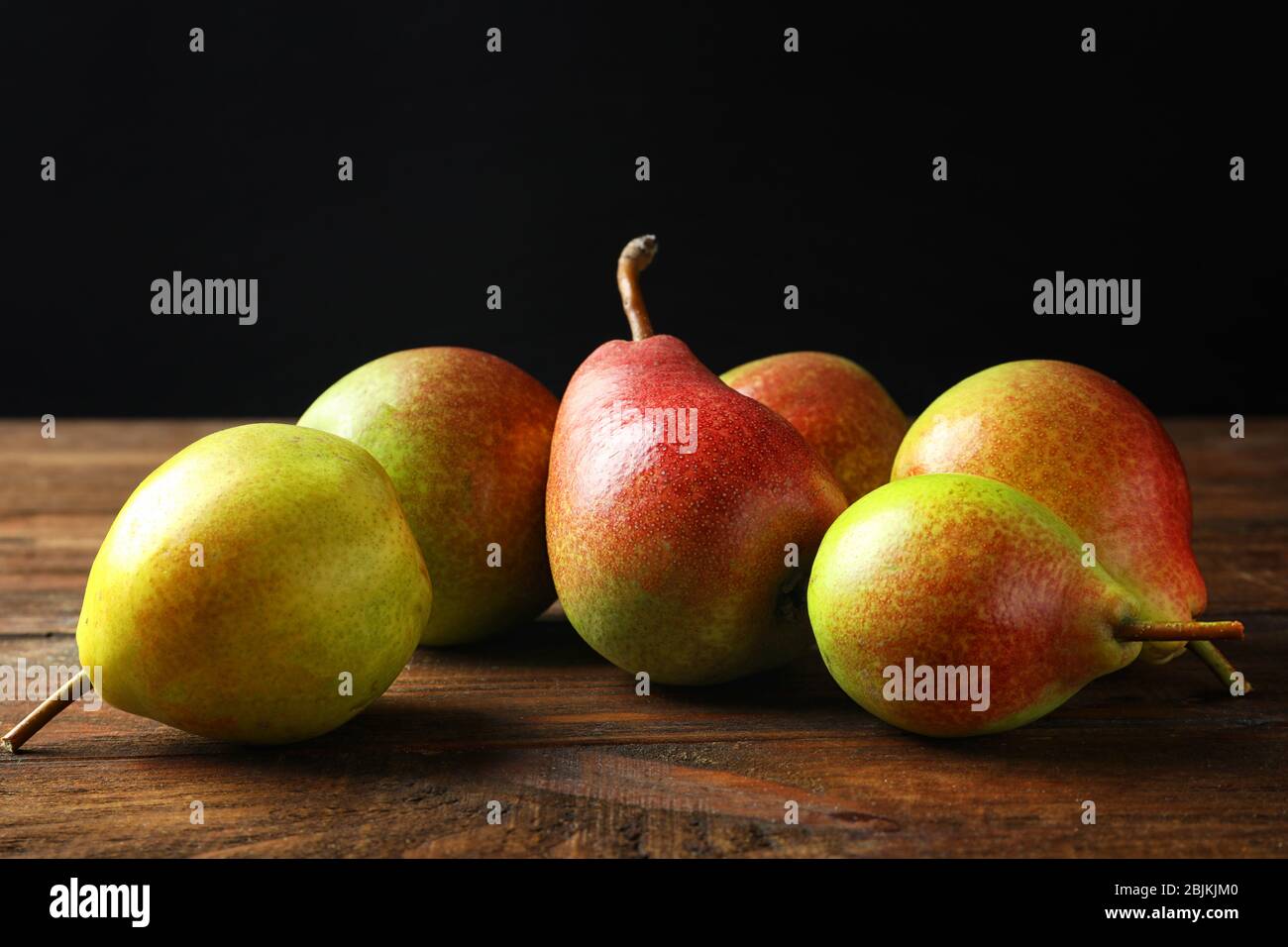 Delicious ripe pears on table Stock Photo - Alamy