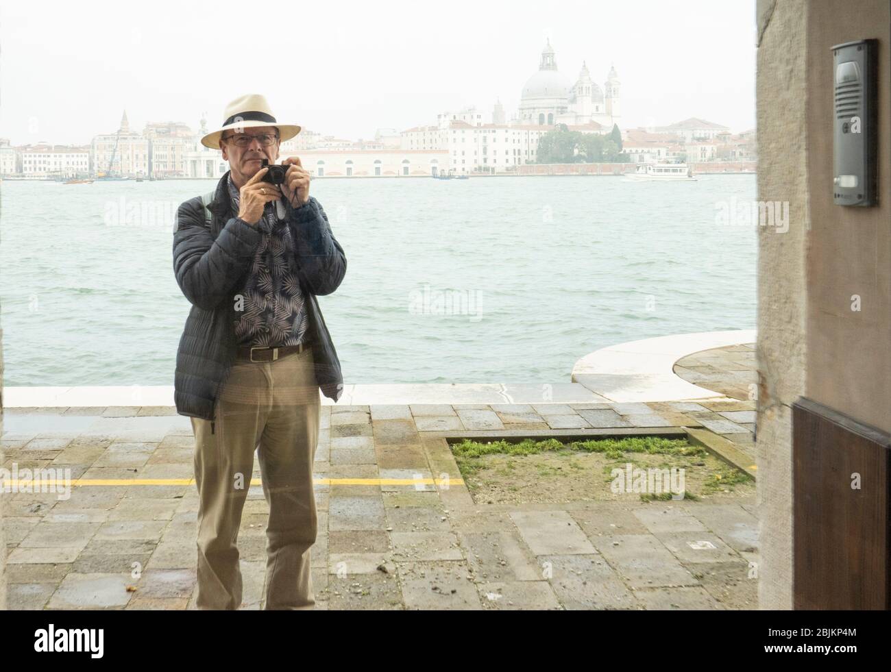 photographer, 68, in Venice, Italy. Stock Photo