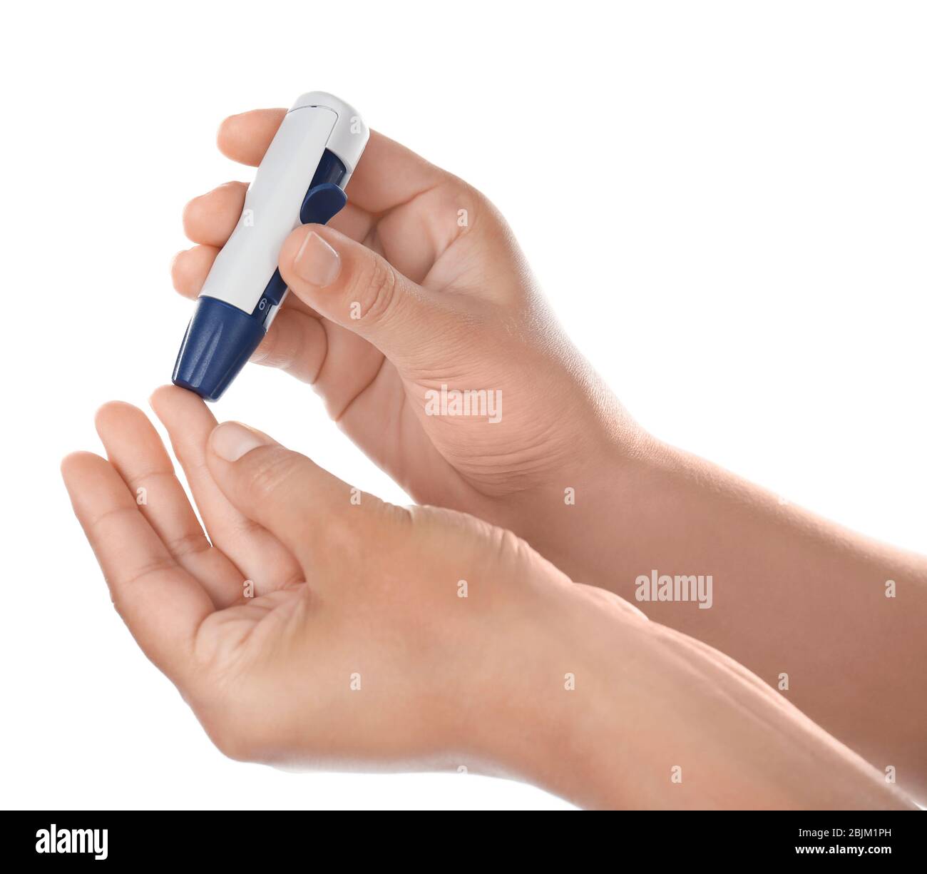Woman taking blood sample with lancet pen on white background. Diabetes
