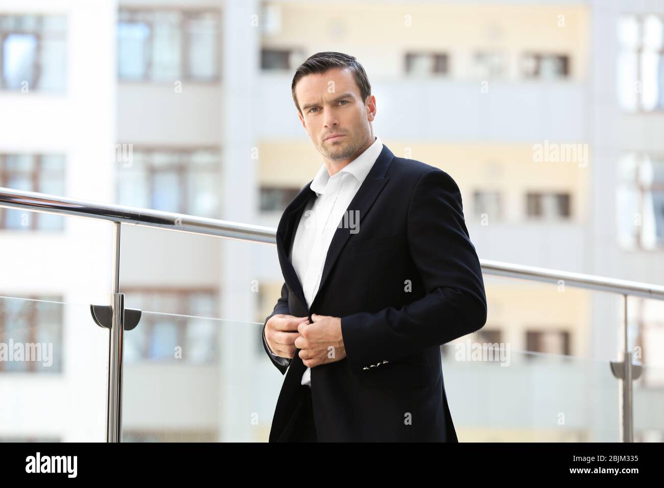 Handsome black button suit hi-res stock photography and images - Alamy