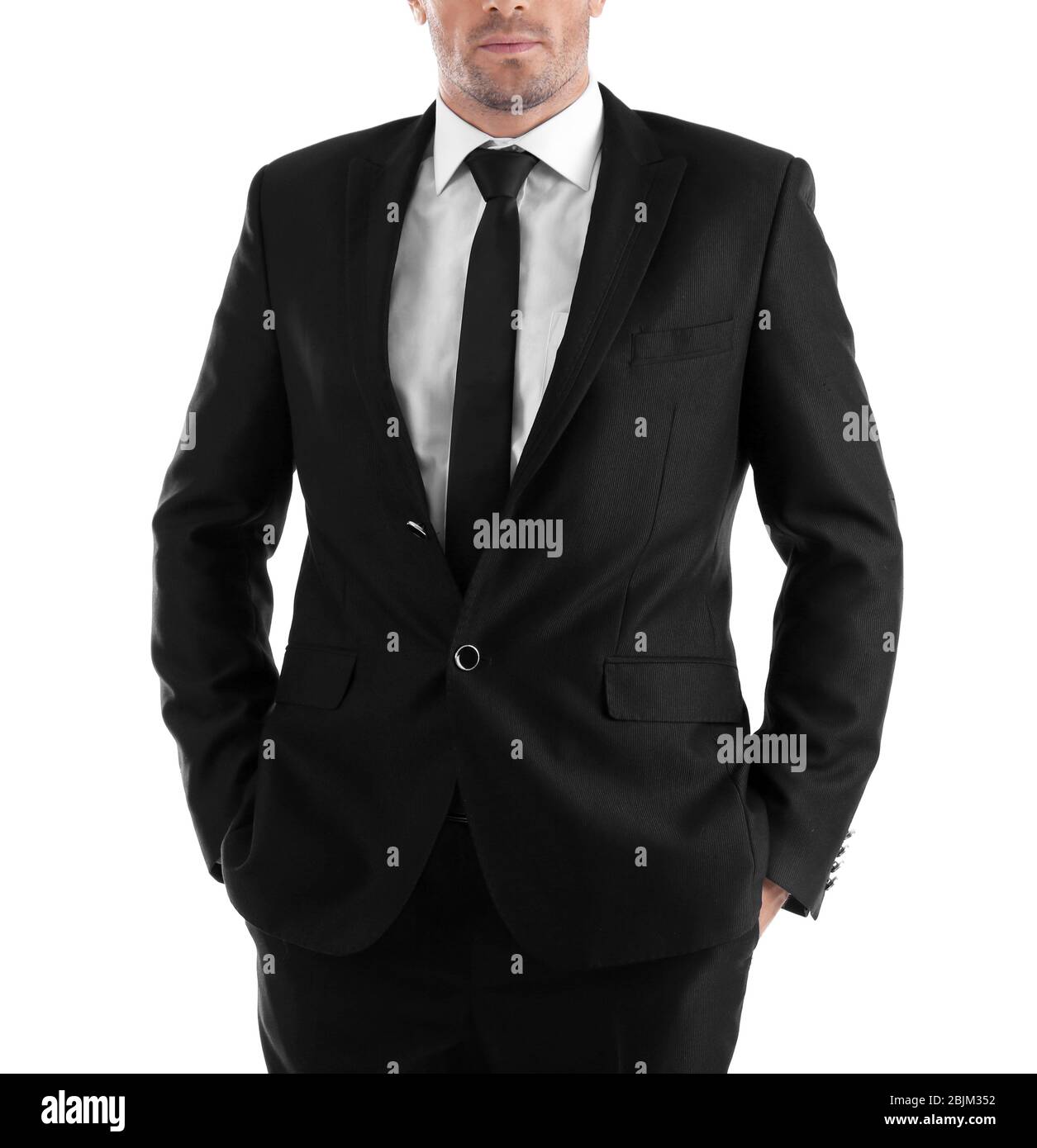 Handsome man in elegant black suit on white background Stock Photo - Alamy