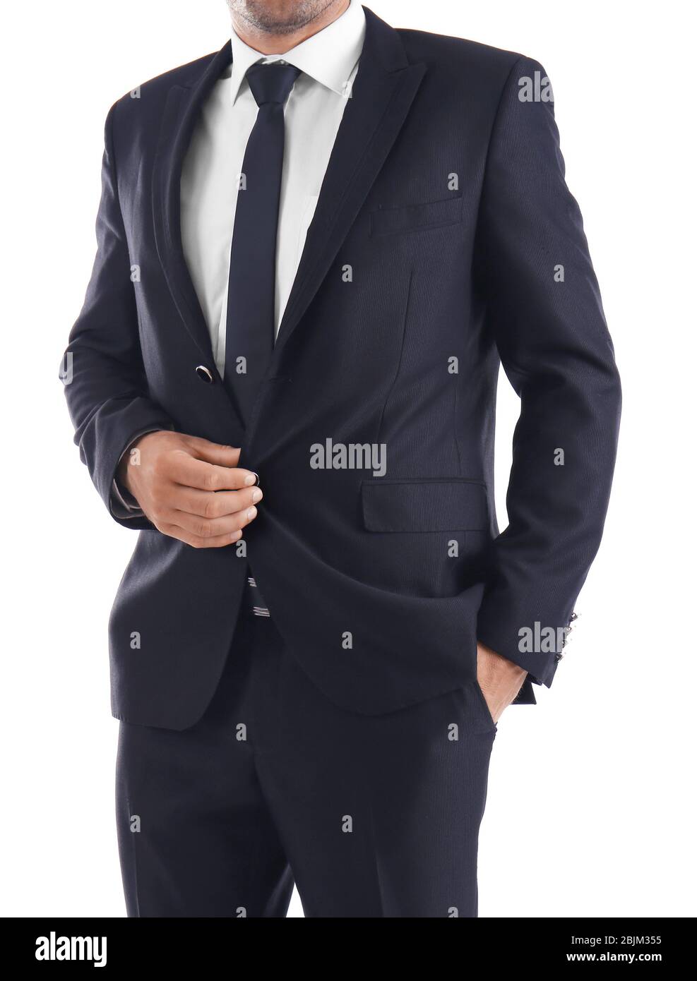 Handsome man in elegant black suit on white background Stock Photo - Alamy