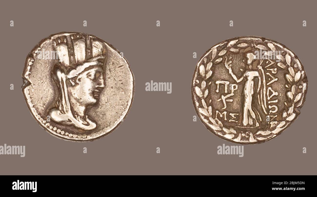 Author: Ancient Greek. Tetradrachm (Coin) Depicting the Goddess Tyche - 80/79 BC - Greco-Roman; Arados, Phoenicia. Silver. 80 BC'79 BC. Aradus. Stock Photo
