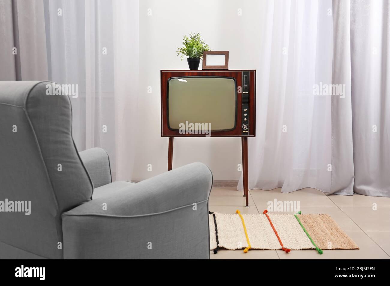 Design of interior with old TV Stock Photo Alamy