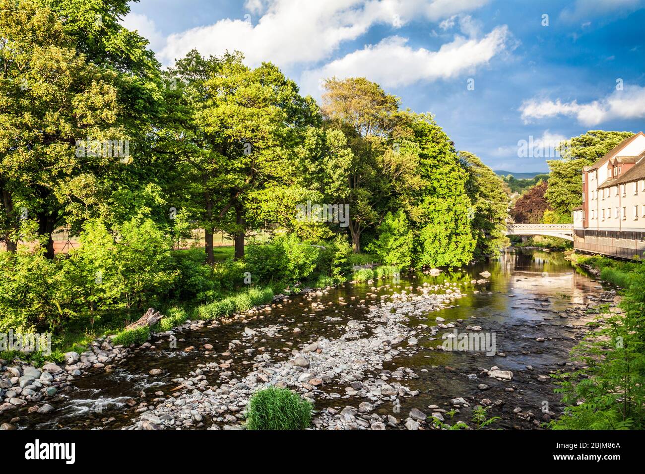 The River Greta, a tributary of the River Derwent, flowing through Keswick. Stock Photo