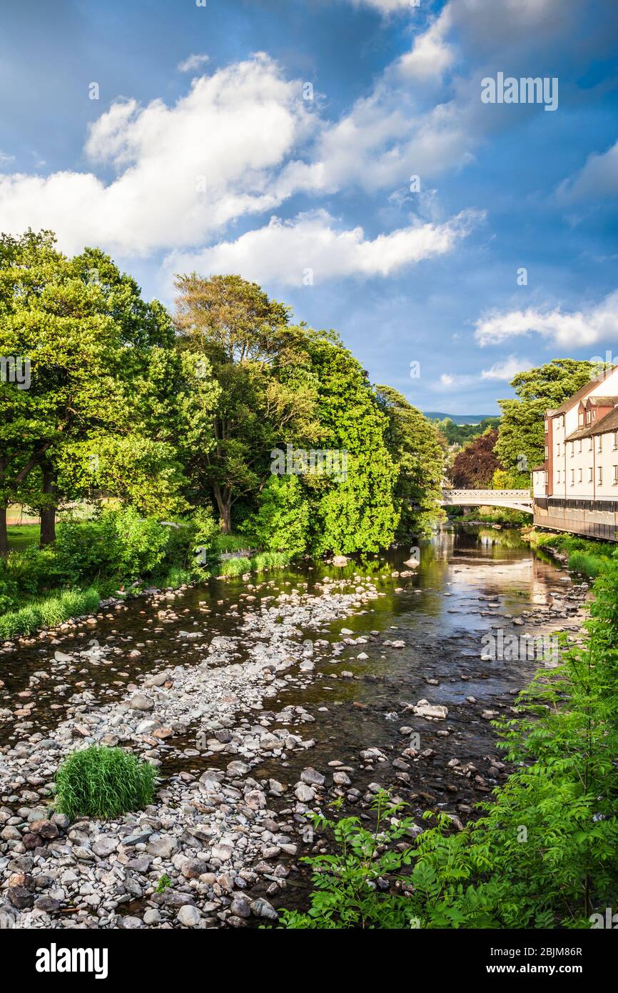 The River Greta, a tributary of the River Derwent, flowing through Keswick. Stock Photo