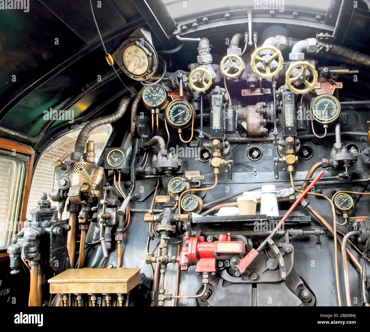Inside the cab of mainline steam locomotive. Stock Photo