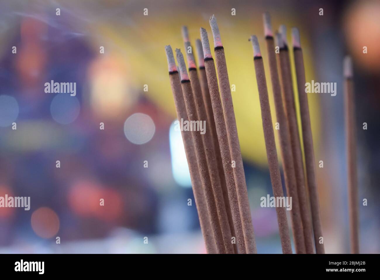 Burning incense sticks at a temple in Tainan, Taiwan Stock Photo
