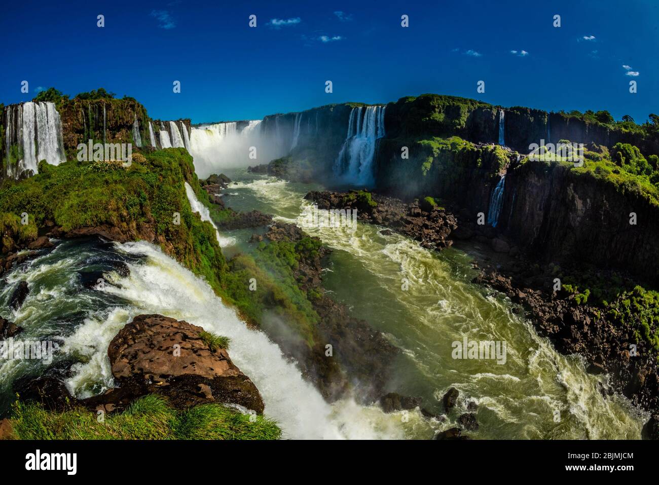 Iguazu Falls (Iguacu in Portugese), on the border of Brazil and Argentina. It is one of the New 7 Wonders of Nature and is a UNESCO World Heritage Stock Photo
