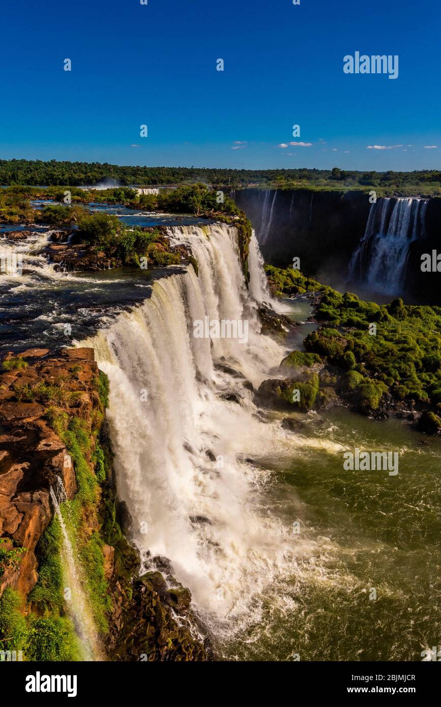 Iguazu Falls (Iguacu in Portugese), on the border of Brazil and Argentina. It is one of the New 7 Wonders of Nature and is a UNESCO World Heritage Stock Photo