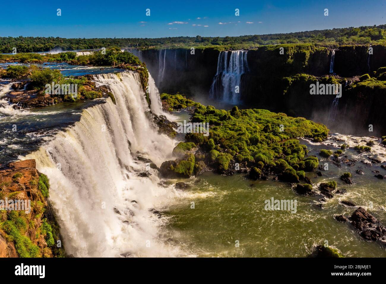 Iguazu Falls (Iguacu in Portugese), on the border of Brazil and Argentina. It is one of the New 7 Wonders of Nature and is a UNESCO World Heritage Stock Photo