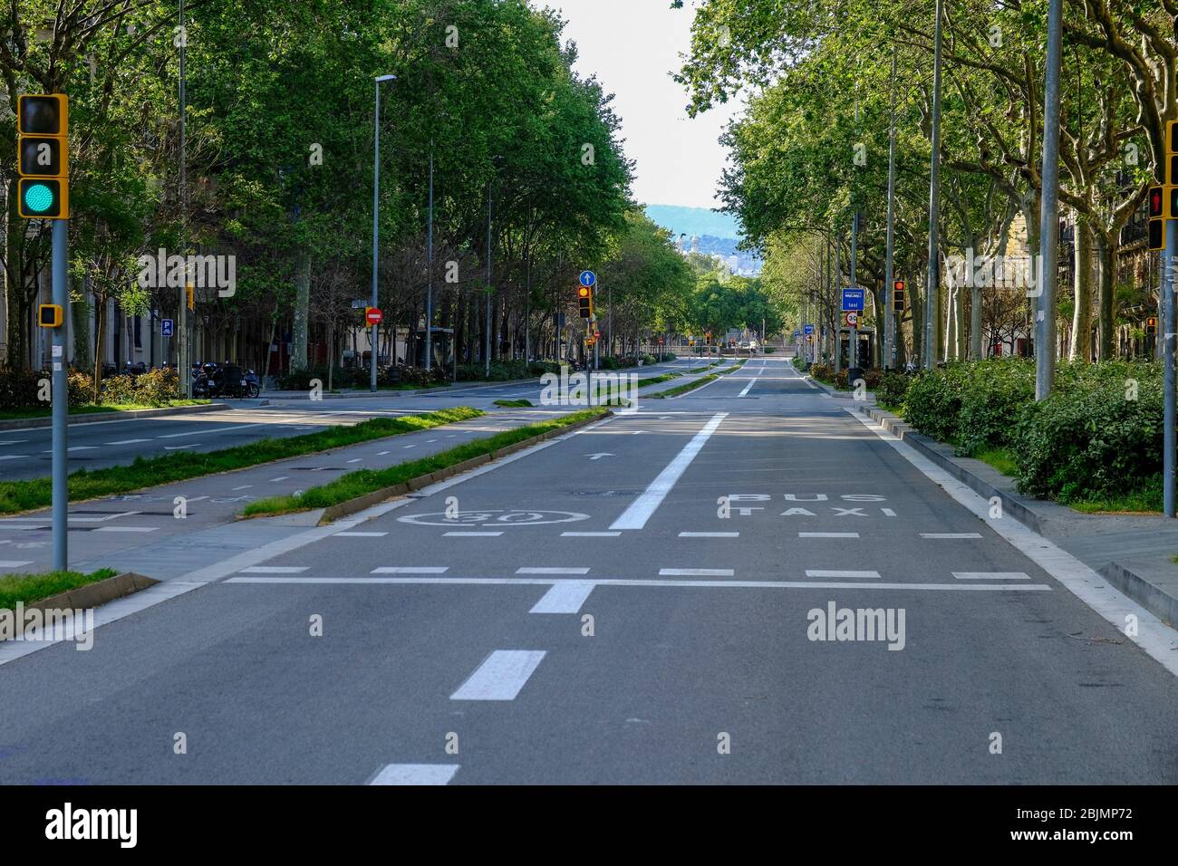 Spain is one of the countries most affected by the Covid-19 coronavirus outbreak. The Paseo de Sant Joan is completely deserted and its passage is Stock Photo