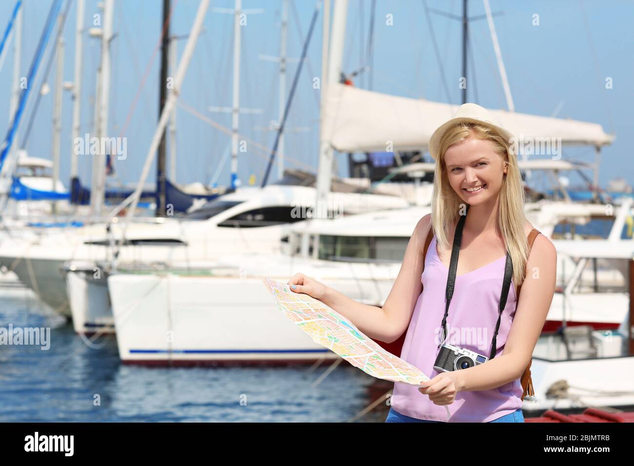 Female tourist map visiting hi-res stock photography and images - Alamy