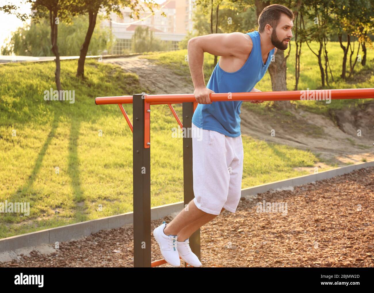 Strong triceps man exercising hi-res stock photography and images - Alamy