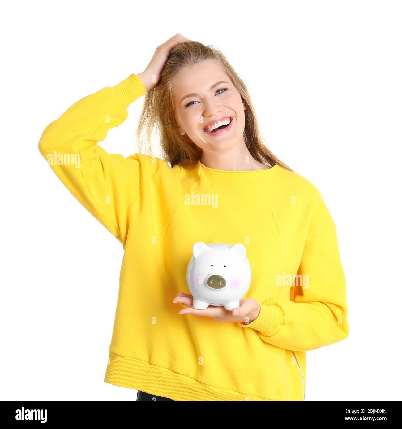 Young woman with piggy bank on white background Stock Photo - Alamy