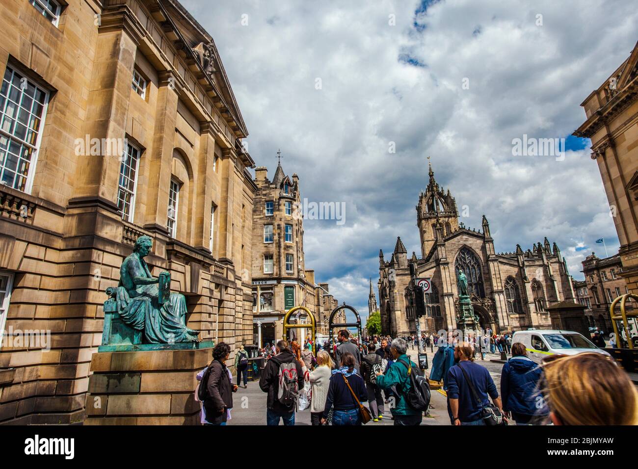 David Hume statue and St Giles´ Cathedral, or the High Kirk of Edinburgh, Royal Mile, High Street, Old Town, Edinburgh, Scotland, United Kingdom, Stock Photo