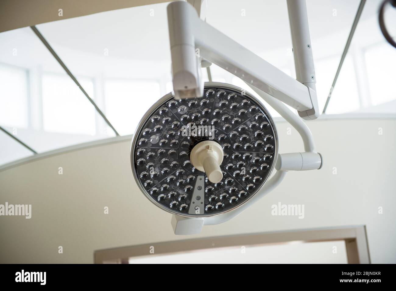 Modern surgical equipment and medical devices in operating room. Operating Room Surgical Lights