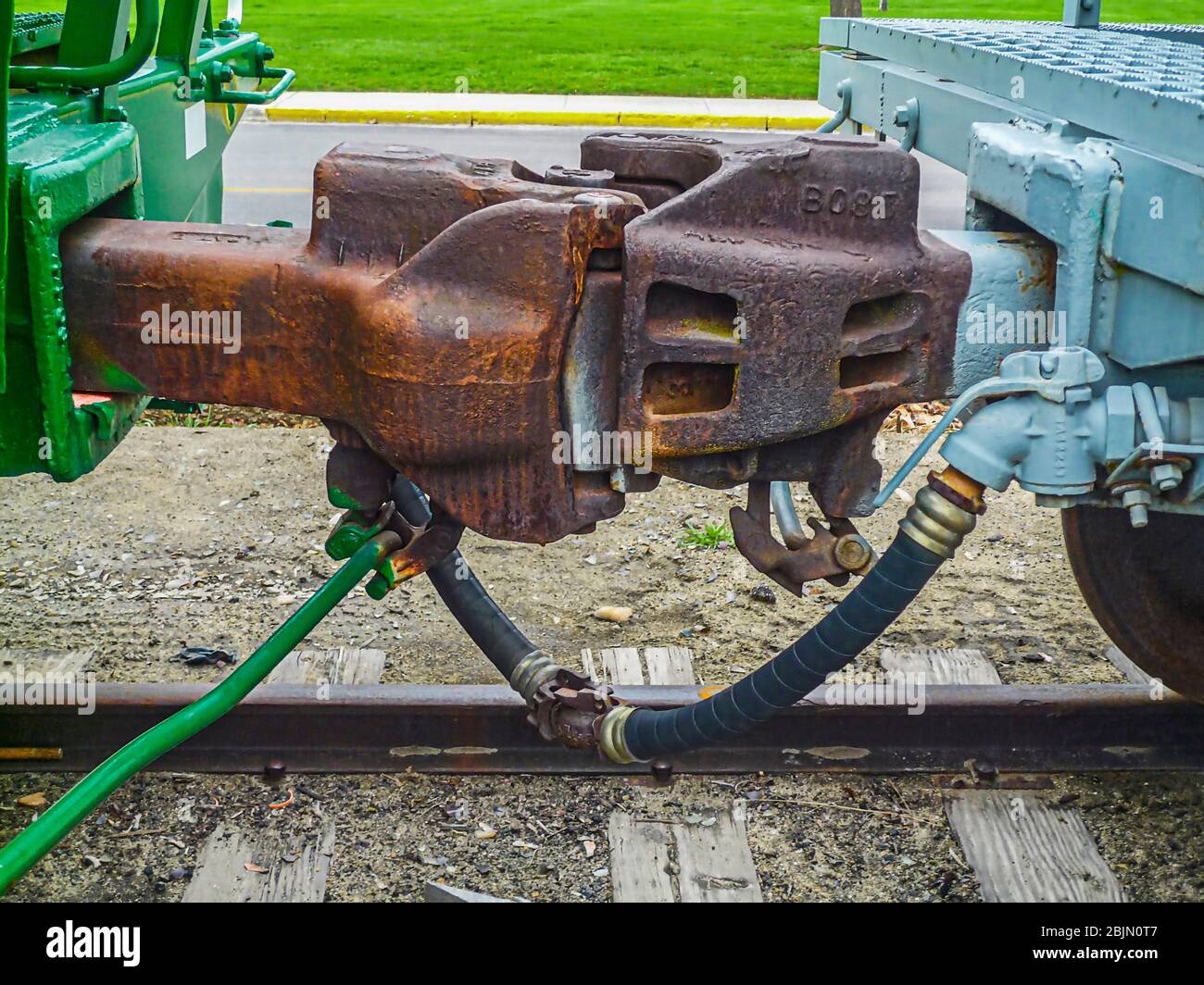 Railroad knuckle coupler two train cars together Stock Photo