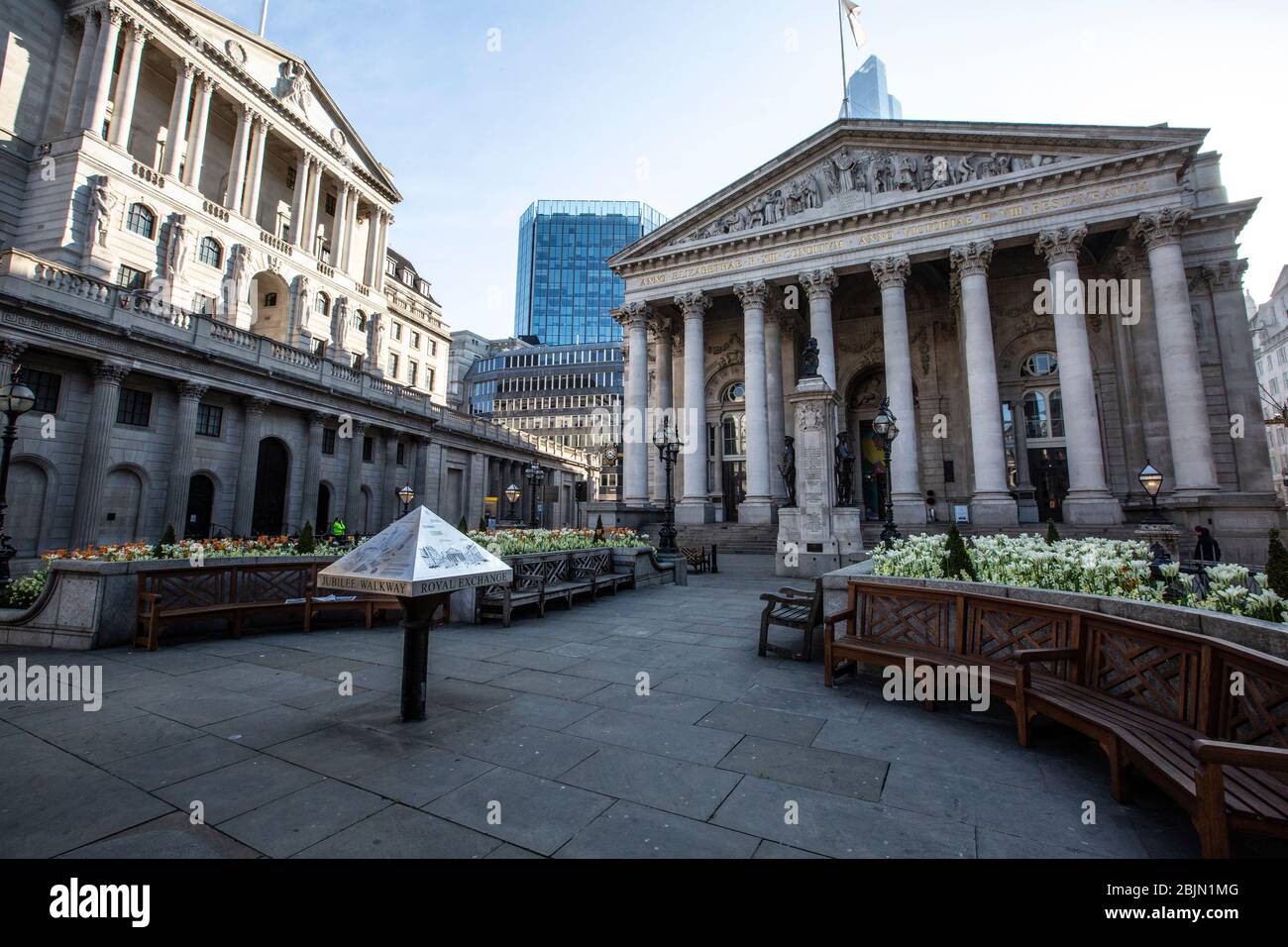 A completely abandoned Bank of England and Royal Exchange early this morning in the heart of the City of London during the coronavirus lockdown, UK Stock Photo