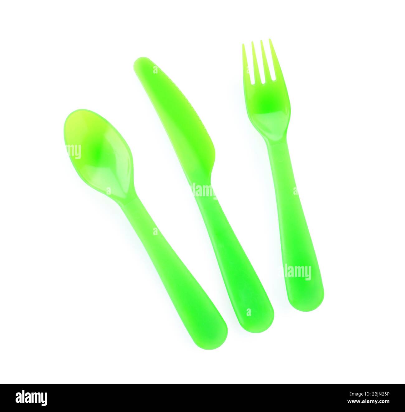 Colorful eating utensils for baby on white background Stock Photo - Alamy