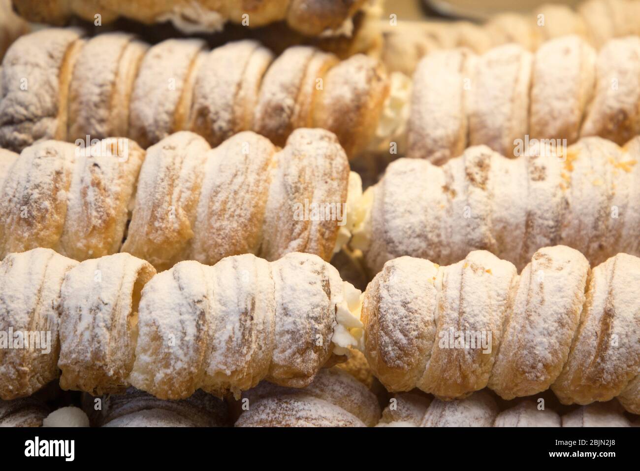 Cream horns filled with vanilla cream Lleida Spain Stock Photo Alamy