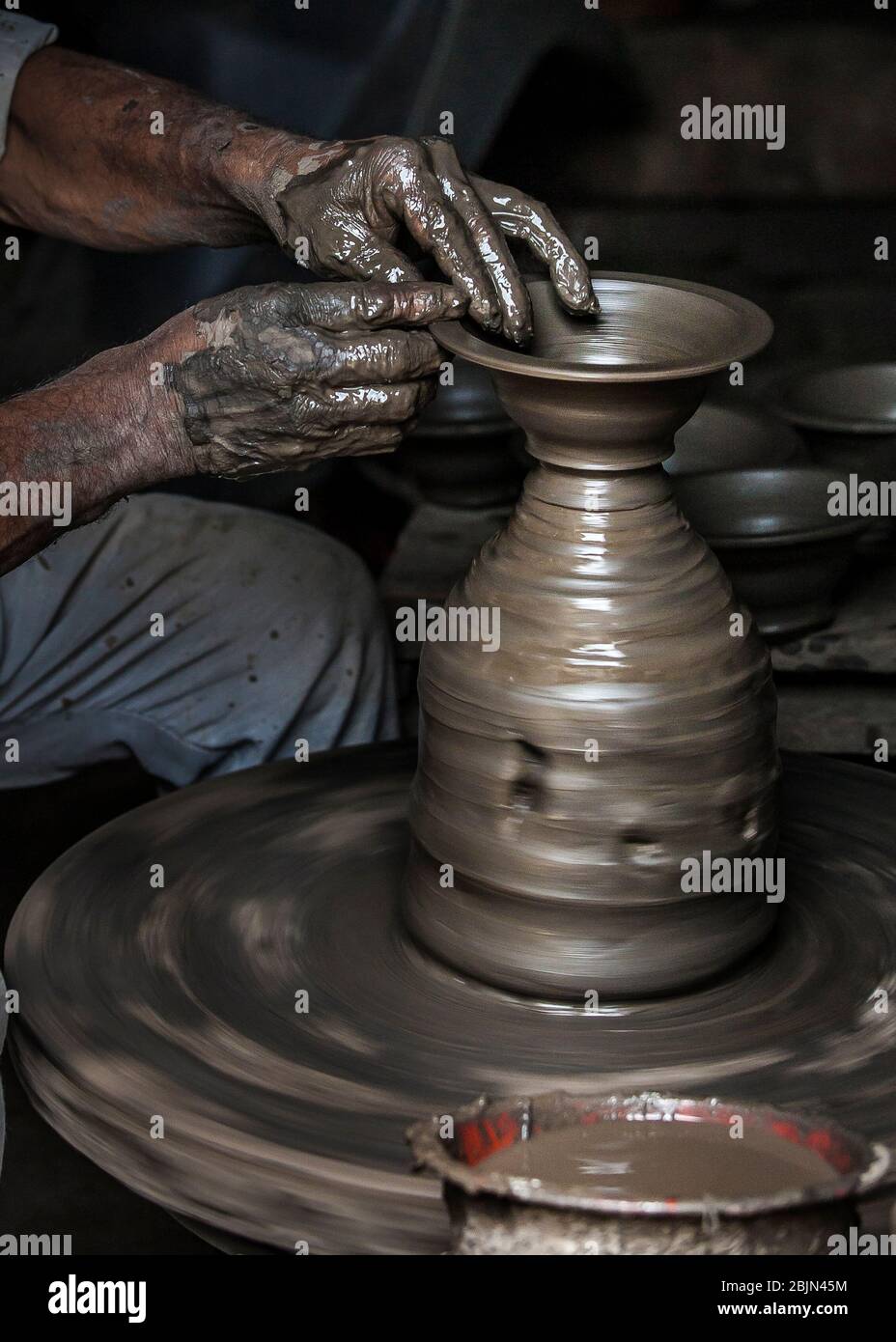 Close-up of a man at a potter's wheel, Nepal Stock Photo