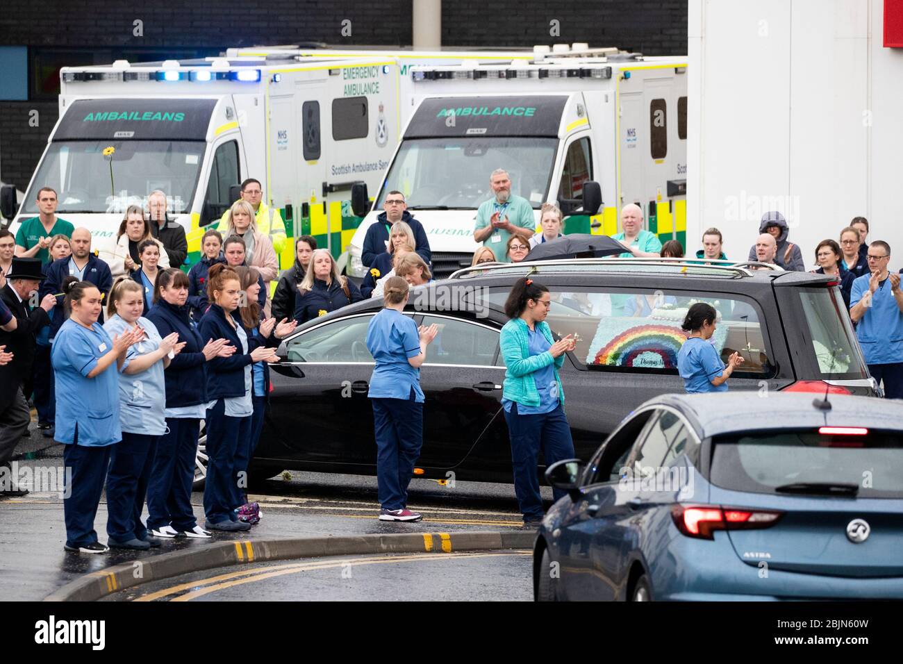 The funeral cortege of NHS worker Jane Murphy passes the Accident and Emergency department at the Edinburgh Royal Infirmary, Edinburgh. Stock Photo