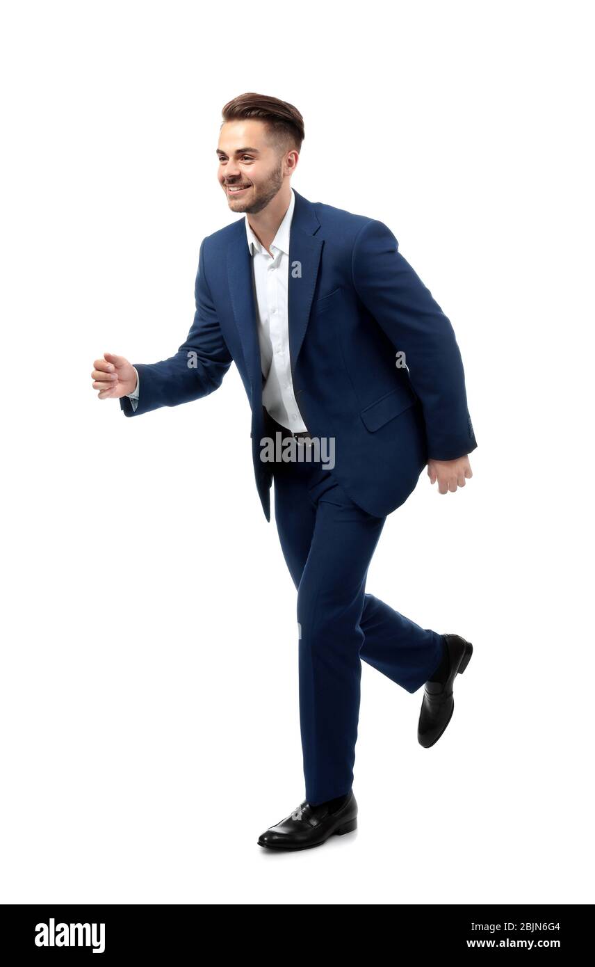 Handsome running businessman on white background Stock Photo - Alamy