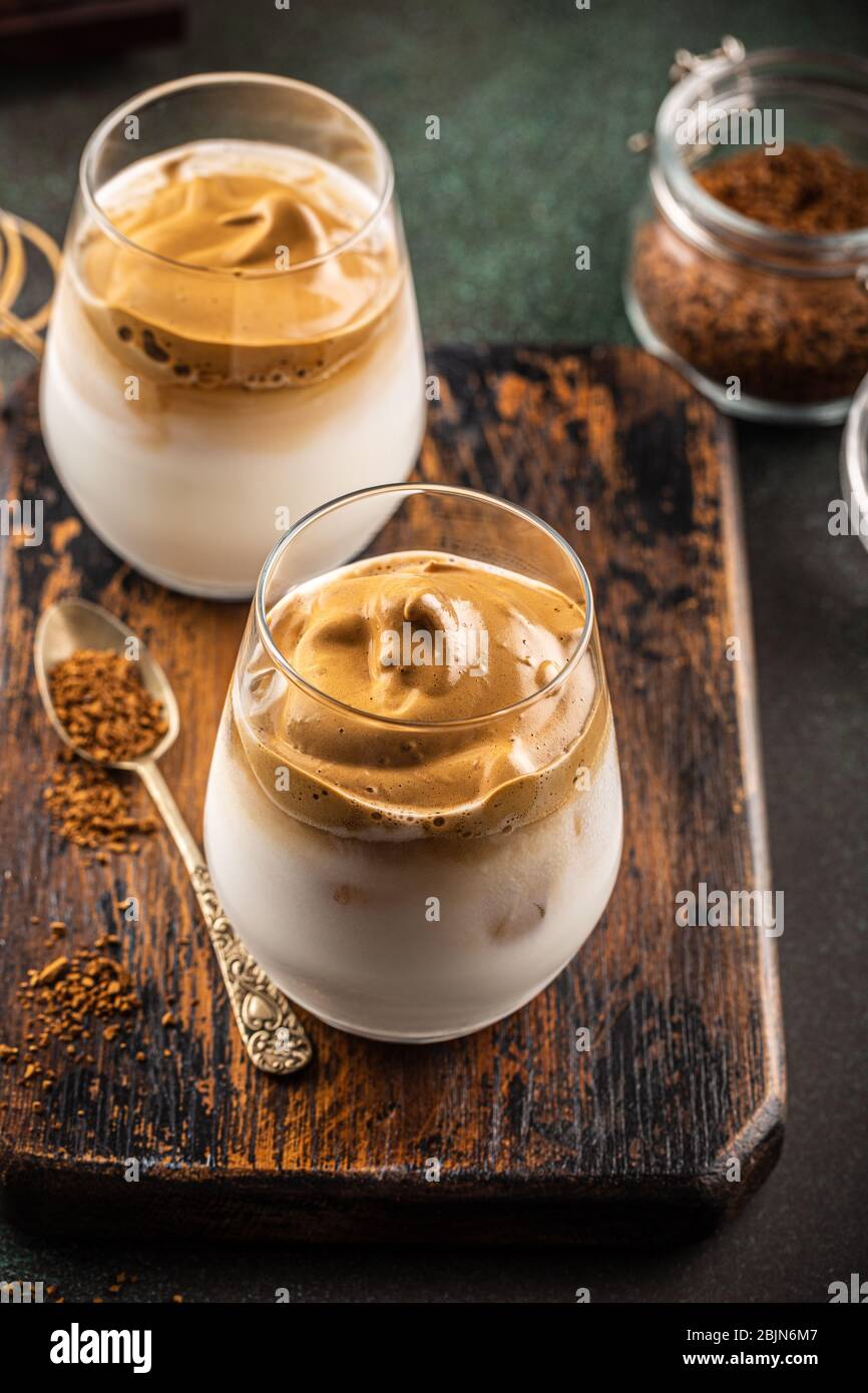 Dalgona coffee in glass cup Stock Photo