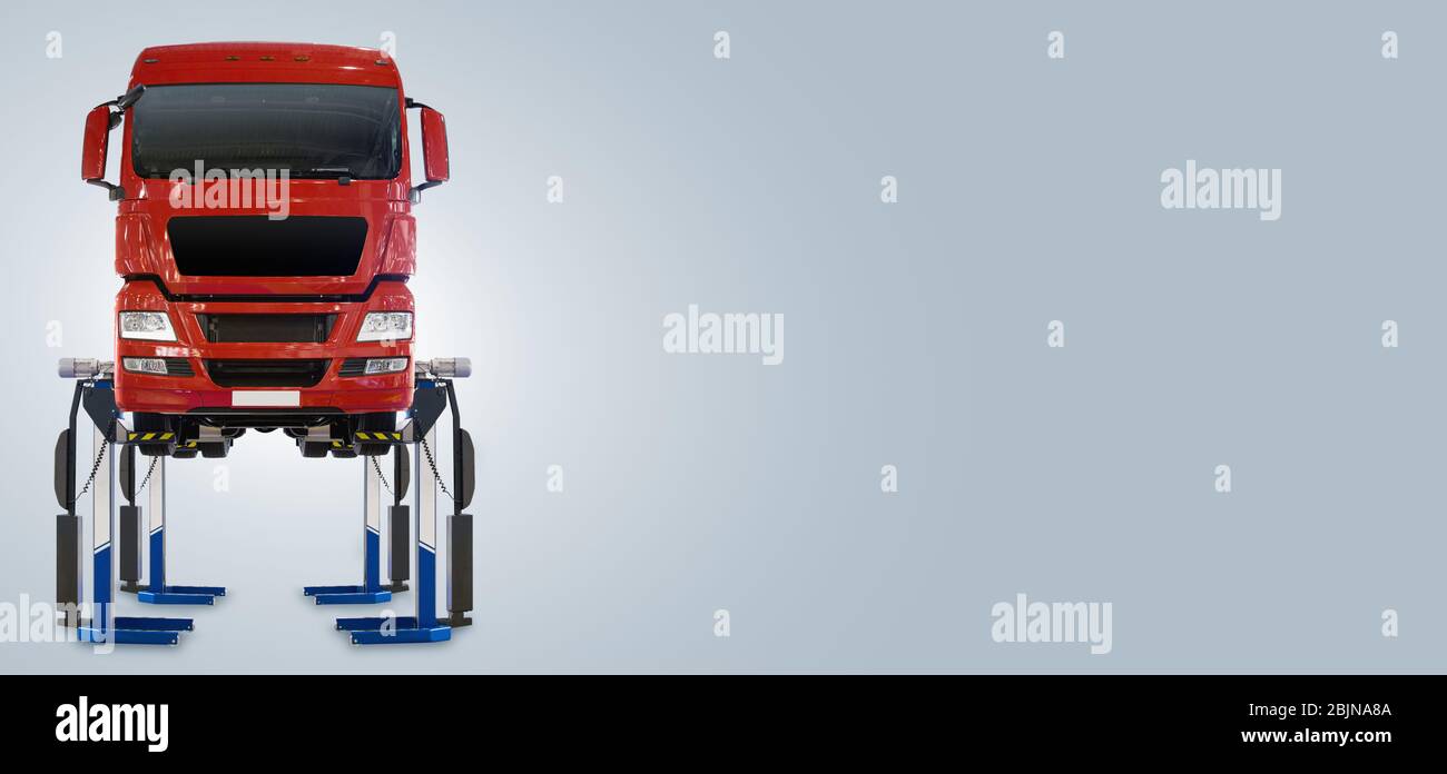 Truck on a lift in a car service Stock Photo - Alamy
