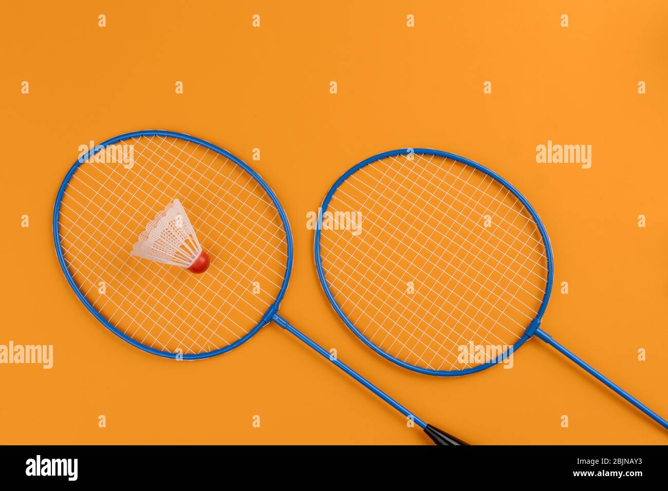 Set of shuttlecock and two badminton rackets Stock Photo Alamy