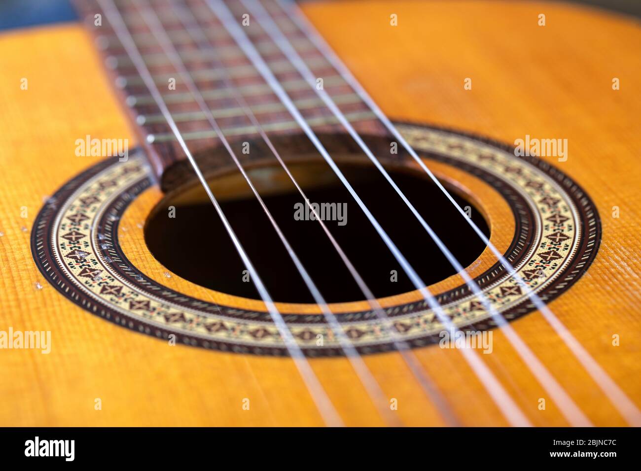 Guitar - soundbox or resonator and strings. Stock Photo