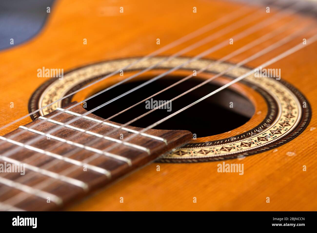 Guitar - soundbox or resonator and strings. Stock Photo