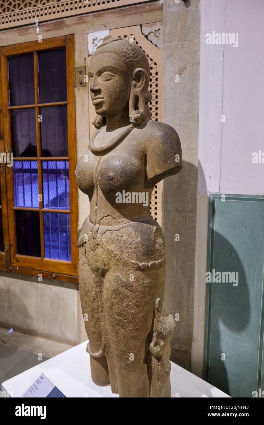 Jaipur, Rajasthan / India - September 29, 2019: 4th century A.D. sand stone sculpture of Yakshi, Hindu goddess of fertility, love and beauty, found ne Stock Photo